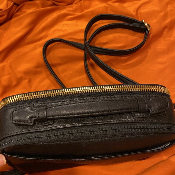 Tumi crossbody bag.
Length is 8.5 inches 
Height is 5.5 inches - Picture 5 of 15